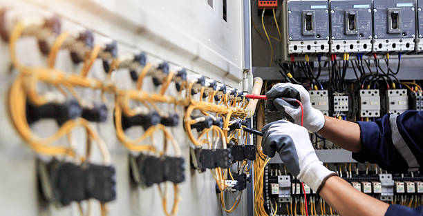 Professional Electrician technician working in Greentown, OH